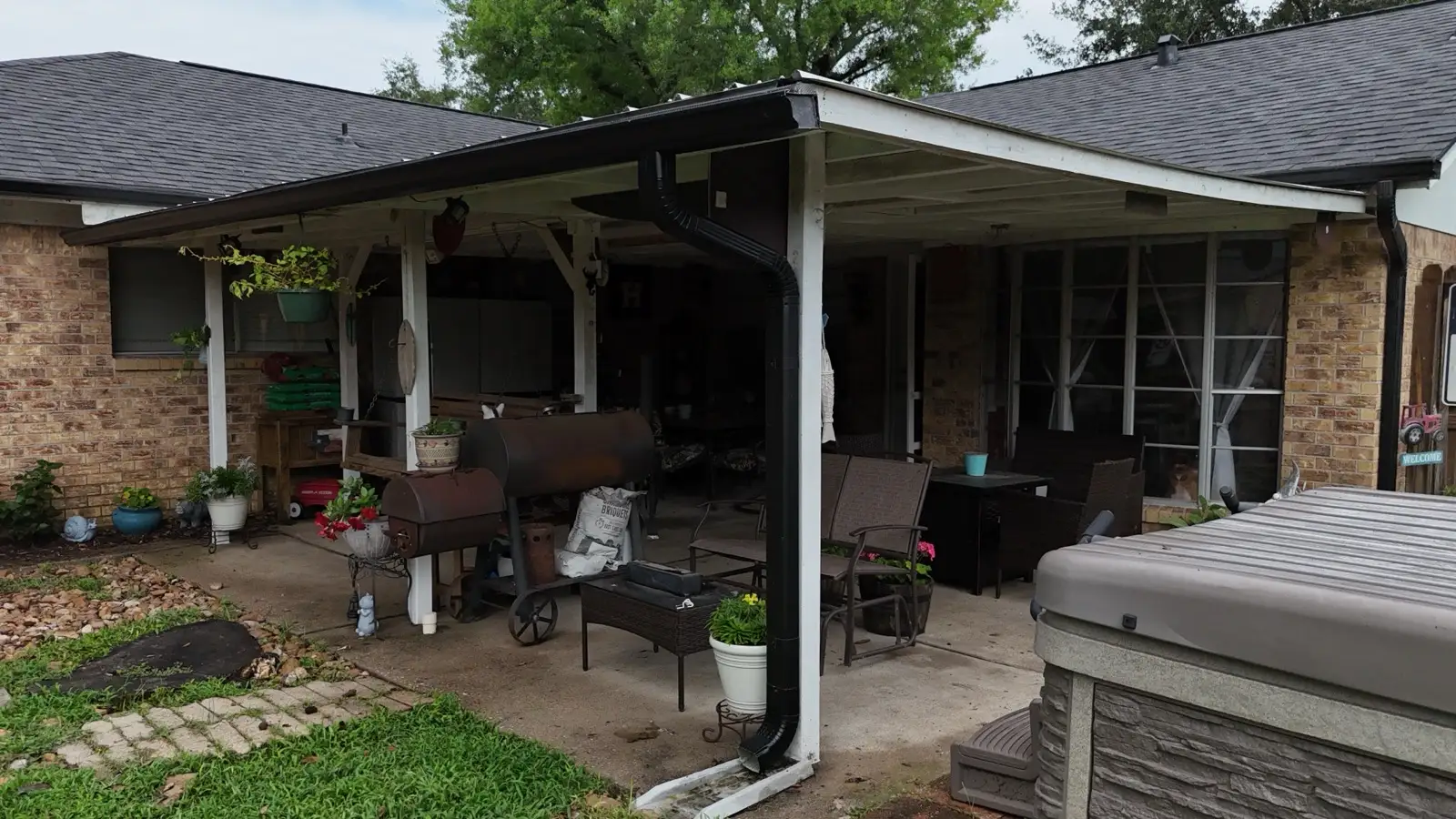 June 21. New gutters and downspouts at the back patio.