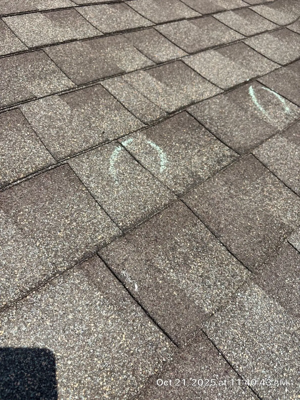 October 21. Chalk circles over impact points on the shingle field — inspection documentation.