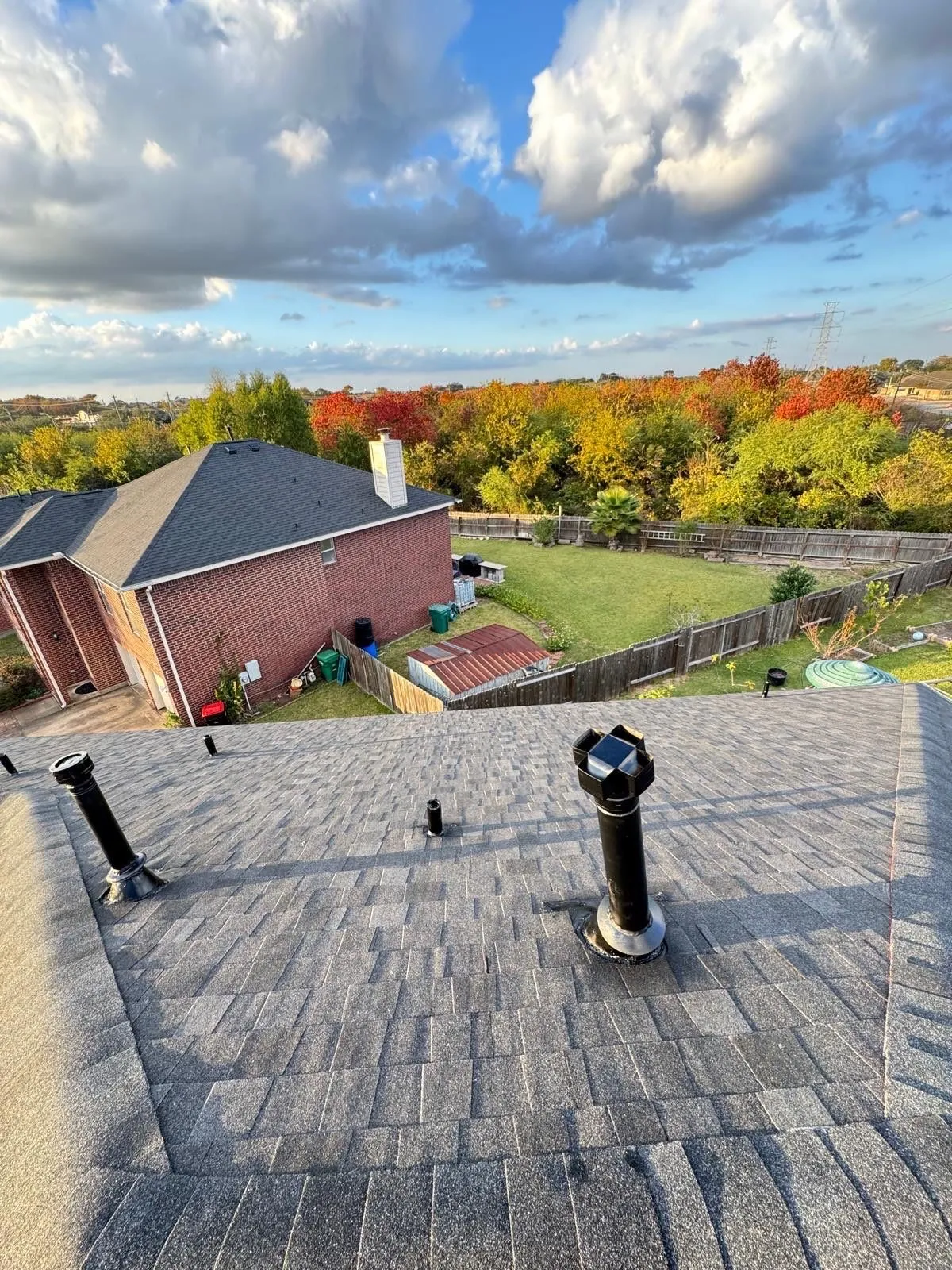 December 12. The finished roof in evening light, new vents in place.