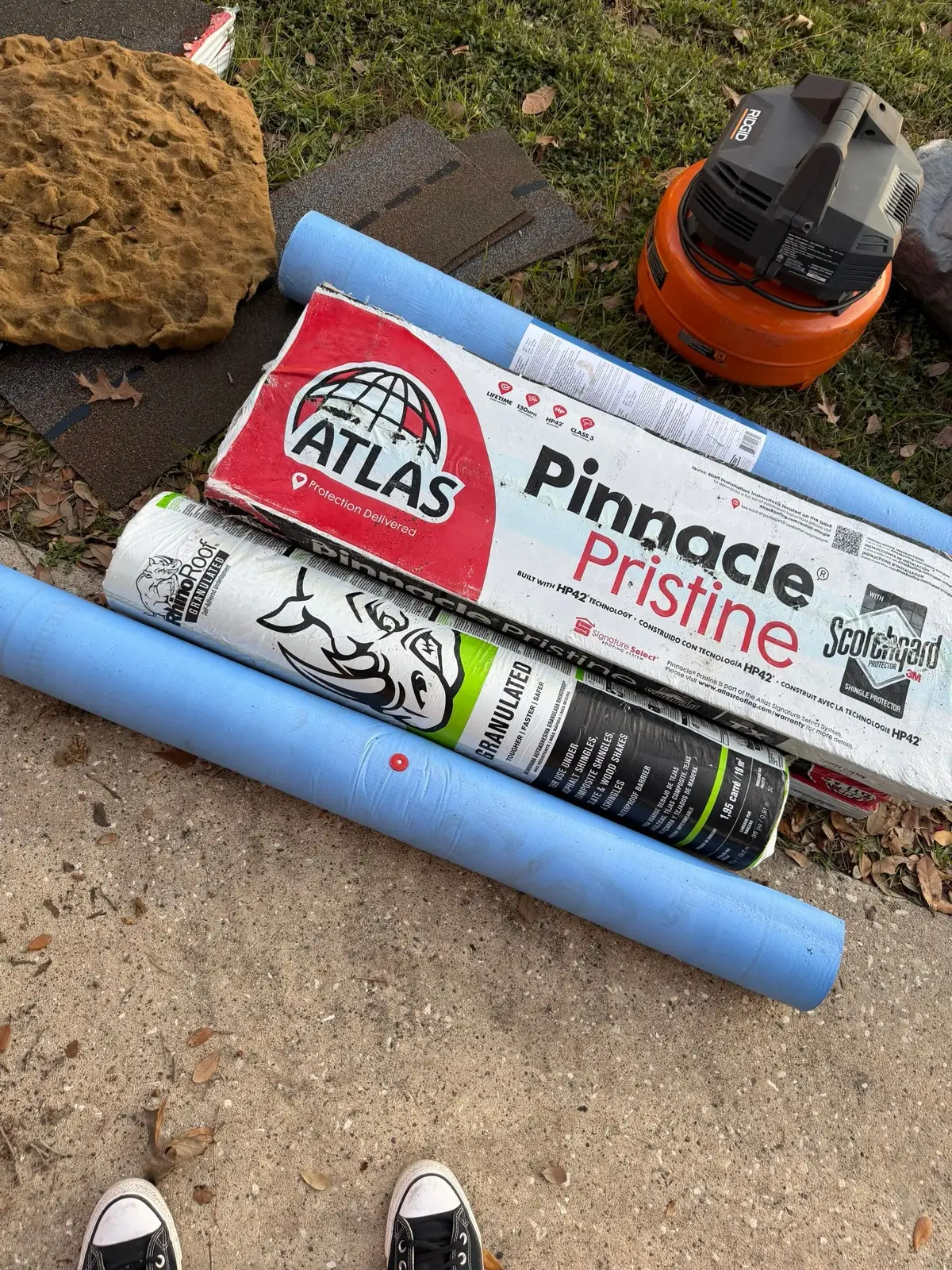 December 18. Atlas Pinnacle Pristine wrappers among the staged materials on the driveway.