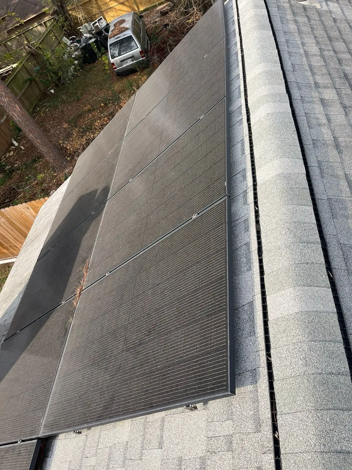 January 7. The complication overhead — a solar array bolted to the roof that needed replacing.