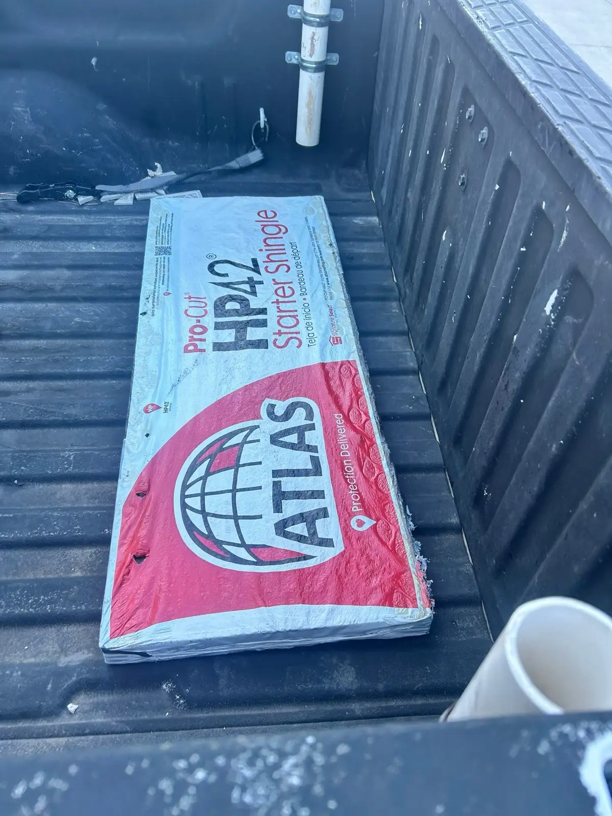 November 4. Atlas Pro-Cut HP42 starter — the bundle label, photographed in the truck bed.