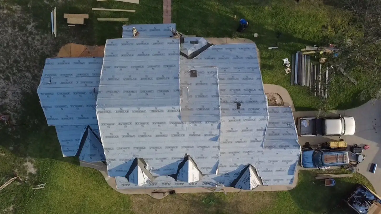 May 14, evening. The whole deck sealed in synthetic underlayment, labels still showing.